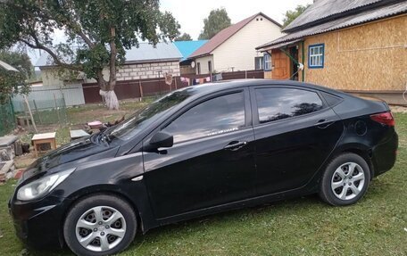 Hyundai Solaris II рестайлинг, 2011 год, 400 000 рублей, 4 фотография