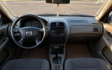 Mazda 323, 1999 год, 299 000 рублей, 6 фотография