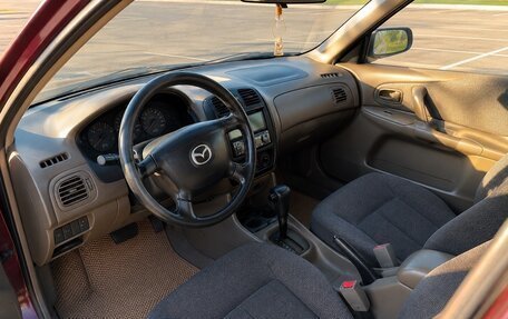 Mazda 323, 1999 год, 299 000 рублей, 5 фотография