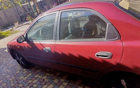 Mazda 323, 1998 год, 220 000 рублей, 4 фотография