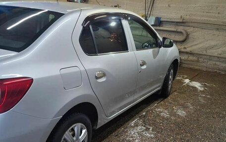 Renault Logan II, 2014 год, 700 000 рублей, 34 фотография