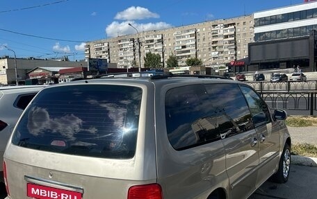 KIA Carnival III, 2004 год, 370 000 рублей, 3 фотография