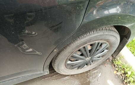 Nissan Tiida, 2010 год, 650 000 рублей, 3 фотография