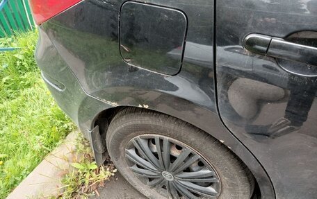 Nissan Tiida, 2010 год, 650 000 рублей, 7 фотография