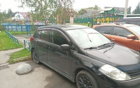 Nissan Tiida, 2010 год, 650 000 рублей, 16 фотография
