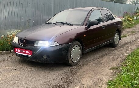 Mitsubishi Carisma I, 1997 год, 87 000 рублей, 2 фотография