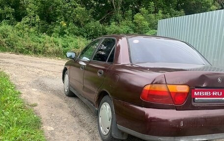 Mitsubishi Carisma I, 1997 год, 87 000 рублей, 5 фотография