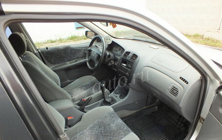 Mazda 323, 1999 год, 110 000 рублей, 11 фотография