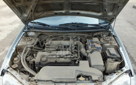 Mazda 323, 1999 год, 110 000 рублей, 12 фотография