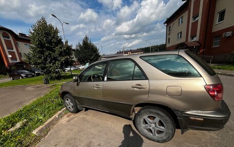 Lexus RX IV рестайлинг, 1999 год, 465 000 рублей, 3 фотография