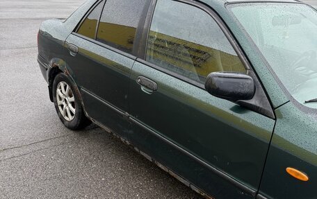 Mazda 323, 1999 год, 175 000 рублей, 26 фотография