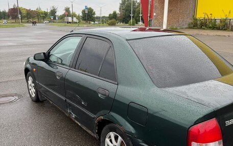 Mazda 323, 1999 год, 175 000 рублей, 25 фотография