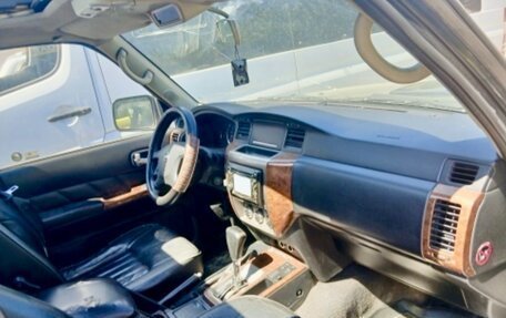 Nissan Patrol, 2009 год, 1 090 000 рублей, 21 фотография