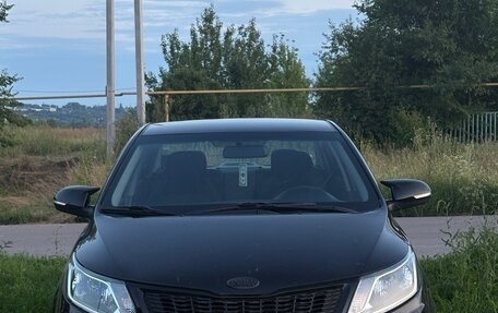 KIA Rio III рестайлинг, 2014 год, 1 050 000 рублей, 13 фотография