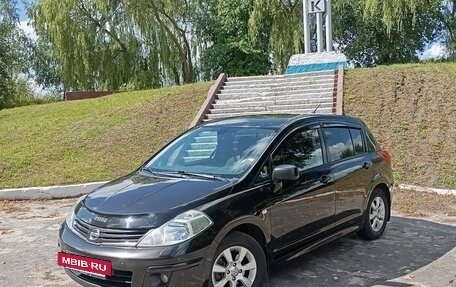 Nissan Tiida, 2010 год, 650 000 рублей, 9 фотография