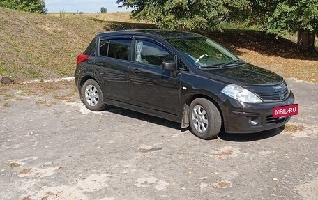 Nissan Tiida, 2010 год, 650 000 рублей, 13 фотография
