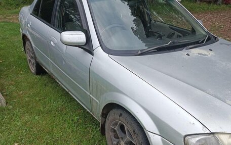 Mazda Familia, 1999 год, 130 000 рублей, 8 фотография