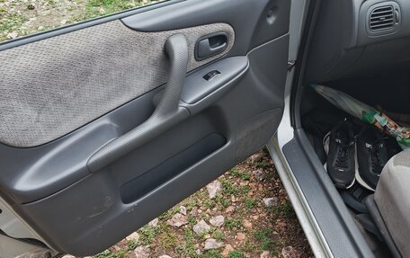 Mazda Familia, 1999 год, 130 000 рублей, 4 фотография