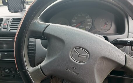 Mazda Familia, 1999 год, 130 000 рублей, 2 фотография