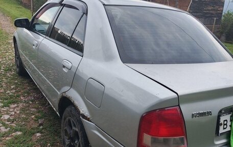 Mazda Familia, 1999 год, 130 000 рублей, 10 фотография