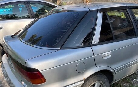 Mitsubishi Lancer VII, 1990 год, 140 000 рублей, 9 фотография