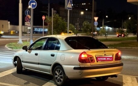 Mitsubishi Carisma I, 1999 год, 215 000 рублей, 4 фотография