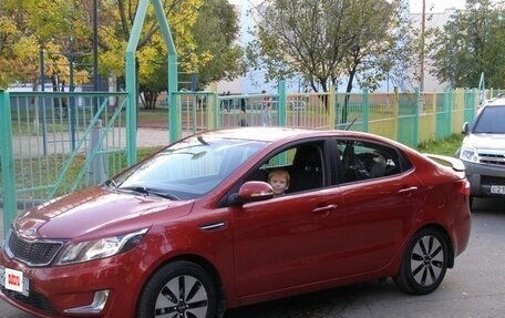 KIA Rio III рестайлинг, 2012 год, 800 000 рублей, 36 фотография