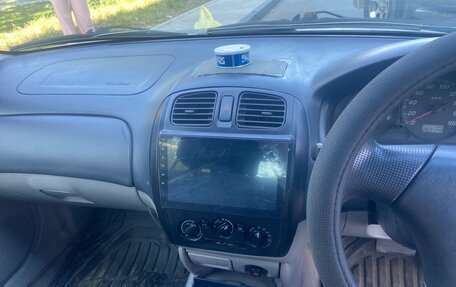 Mazda Familia, 2002 год, 200 000 рублей, 9 фотография