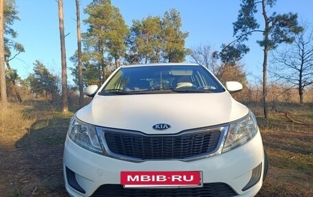 KIA Rio III рестайлинг, 2014 год, 900 000 рублей, 23 фотография
