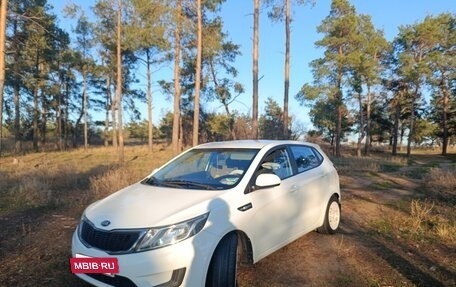 KIA Rio III рестайлинг, 2014 год, 900 000 рублей, 21 фотография