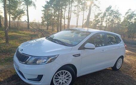 KIA Rio III рестайлинг, 2014 год, 900 000 рублей, 34 фотография