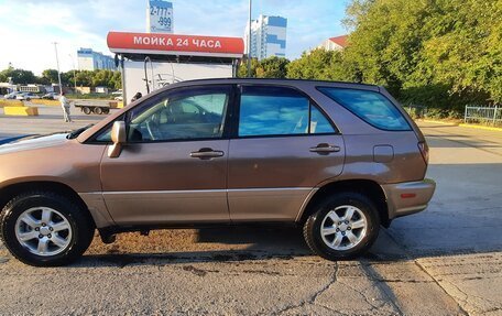 Lexus RX IV рестайлинг, 1999 год, 600 000 рублей, 3 фотография
