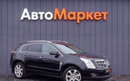 Cadillac SRX II рестайлинг, 2011 год, 999 000 рублей, 1 фотография