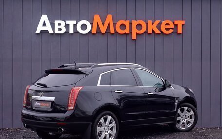 Cadillac SRX II рестайлинг, 2011 год, 999 000 рублей, 2 фотография