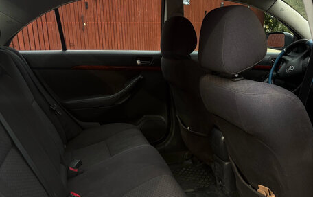 Toyota Avensis III рестайлинг, 2004 год, 15 фотография