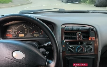 Toyota Avensis III рестайлинг, 1998 год, 310 000 рублей, 7 фотография