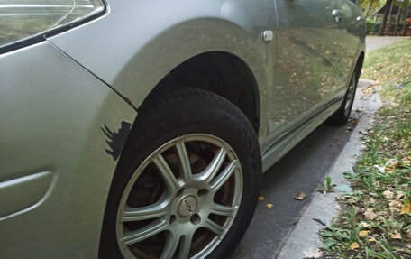 Nissan Tiida, 2012 год, 600 000 рублей, 11 фотография
