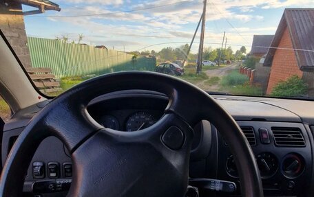 Daihatsu Sirion, 2004 год, 150 000 рублей, 13 фотография
