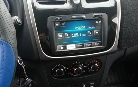 Renault Logan II, 2014 год, 650 000 рублей, 11 фотография