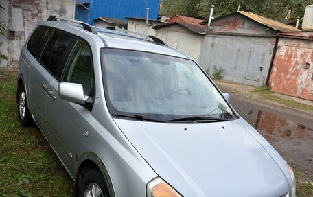 KIA Carnival III, 2009 год, 900 000 рублей, 11 фотография
