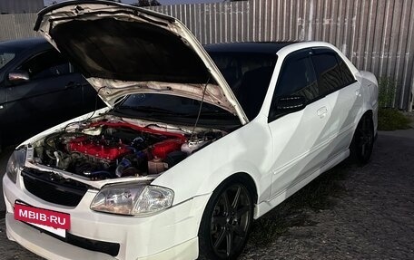 Mazda Familia, 1999 год, 375 000 рублей, 3 фотография