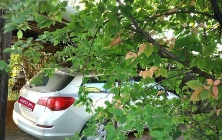Opel Astra J, 2012 год, 850 000 рублей, 1 фотография