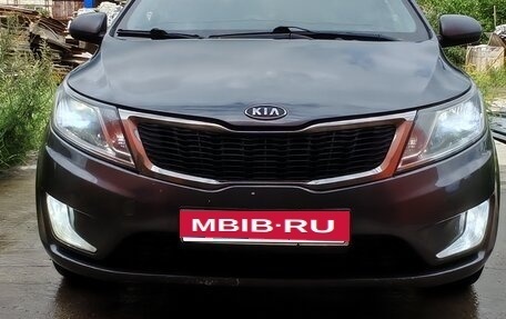 KIA Rio III рестайлинг, 2012 год, 700 000 рублей, 21 фотография