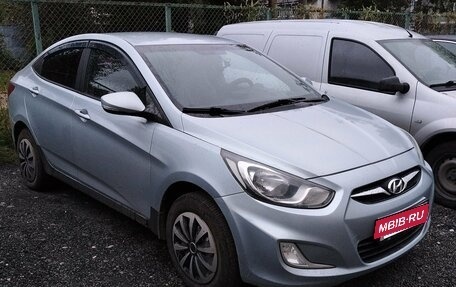Hyundai Solaris II рестайлинг, 2011 год, 650 000 рублей, 2 фотография