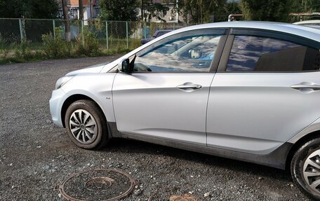 Hyundai Solaris II рестайлинг, 2011 год, 650 000 рублей, 14 фотография