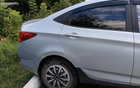 Hyundai Solaris II рестайлинг, 2011 год, 650 000 рублей, 19 фотография