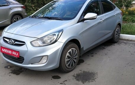 Hyundai Solaris II рестайлинг, 2011 год, 650 000 рублей, 17 фотография