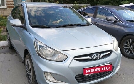 Hyundai Solaris II рестайлинг, 2011 год, 650 000 рублей, 20 фотография