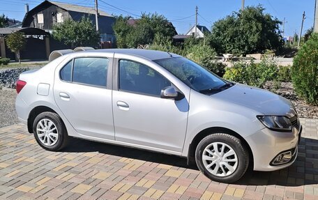 Renault Logan II, 2014 год, 715 000 рублей, 2 фотография