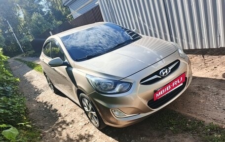 Hyundai Solaris II рестайлинг, 2011 год, 720 000 рублей, 19 фотография